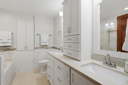 Double vanity offers convenience and generous storage.