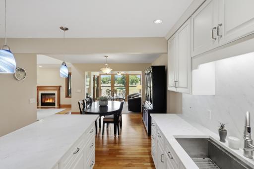 Generous center island provides additional seating and preparation space.