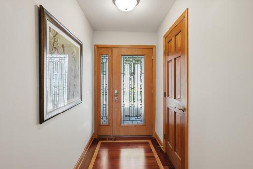 Inviting front entry welcomes guests with warmth and elegance.