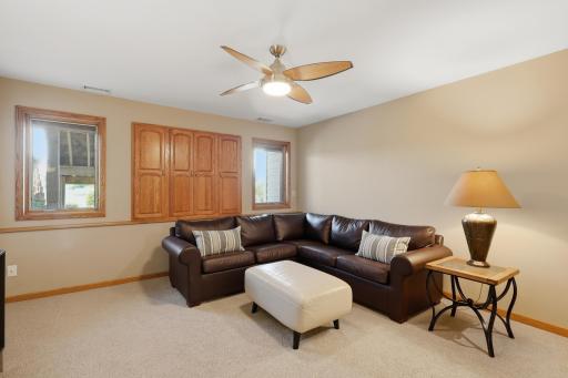 Spacious family room creates the perfect setting for movie nights and gatherings.