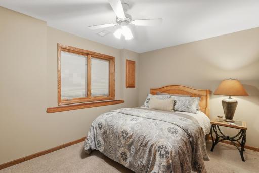 Additional bedroom offers comfort and flexibility for family or guests.