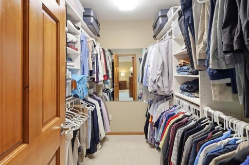 Walk-in closet provides ample storage and organization.