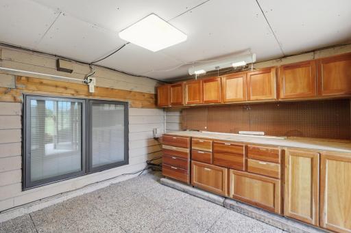 Golf cart garage offers convenient storage and easy course access.