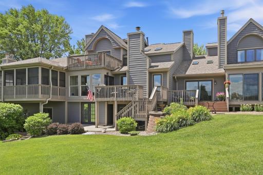 Stunning curb appeal with timeless architecture and meticulously landscaped grounds.
