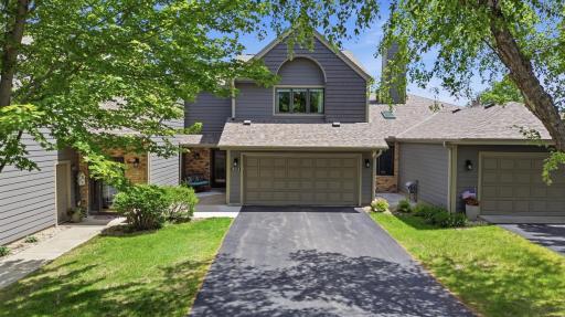 Attractive exterior architecture blends elegance and low-maintenance living in a premier golf course community.
