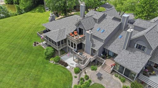 Stunning aerial image showcasing mature landscaping and golf course vistas.
