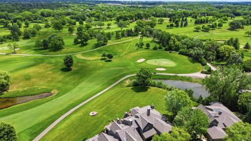 Drone view highlighting the homeâs premium location along the 10th hole.