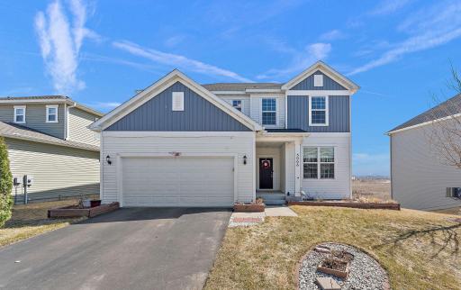 Welcome home! This thoughtfully cared-for home exterior features a new modern color palette, and a sun-drenched, southeast-facing orientation.