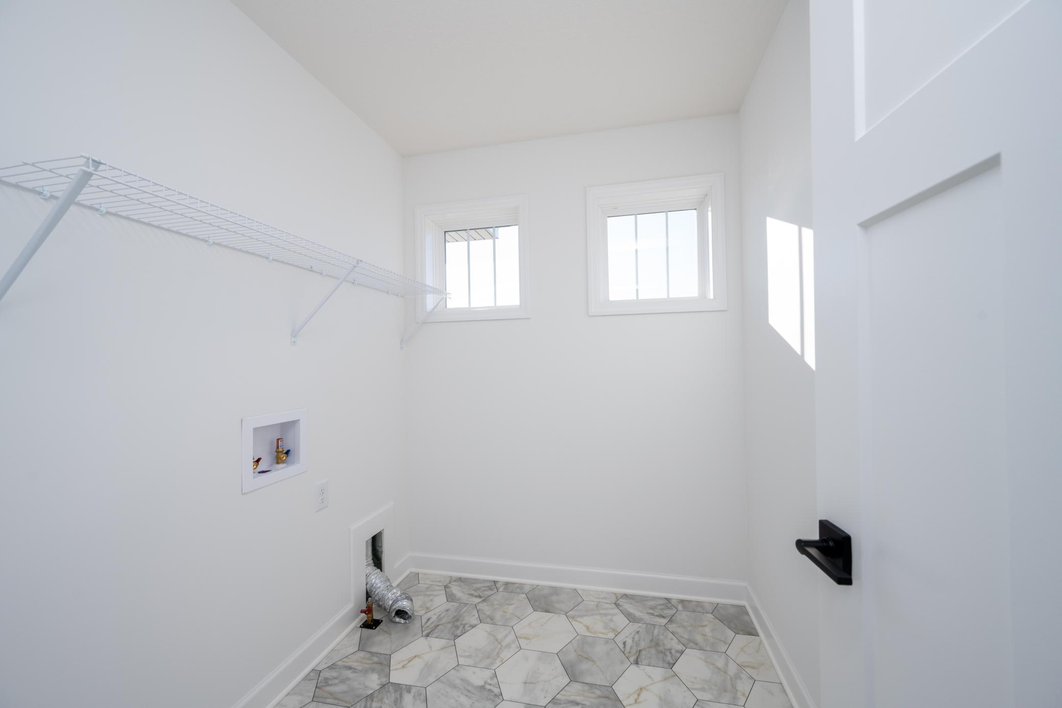 (Photo of a similar home, actual finishes may vary)