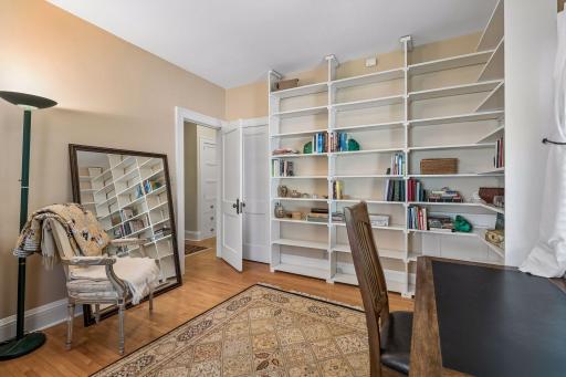 A book lover's dream, featuring custom built-ins and a quiet setting for work or reflection.