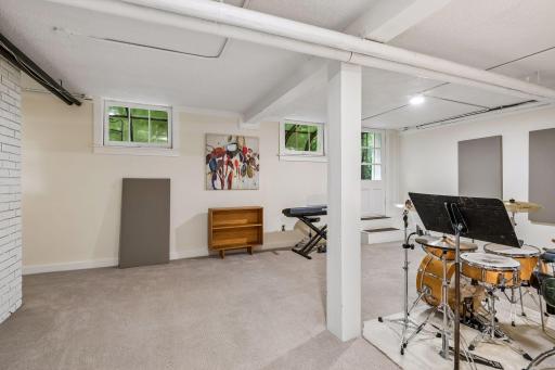 Walk out lower-level to the solarium and private back yard.