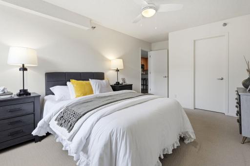Comfortable bedroom with generous space for a full bedroom setup.