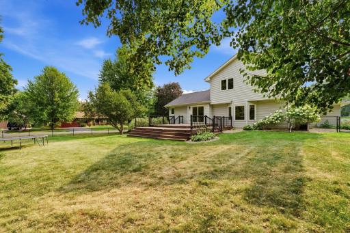 Fenced back yard with deck, corner lot