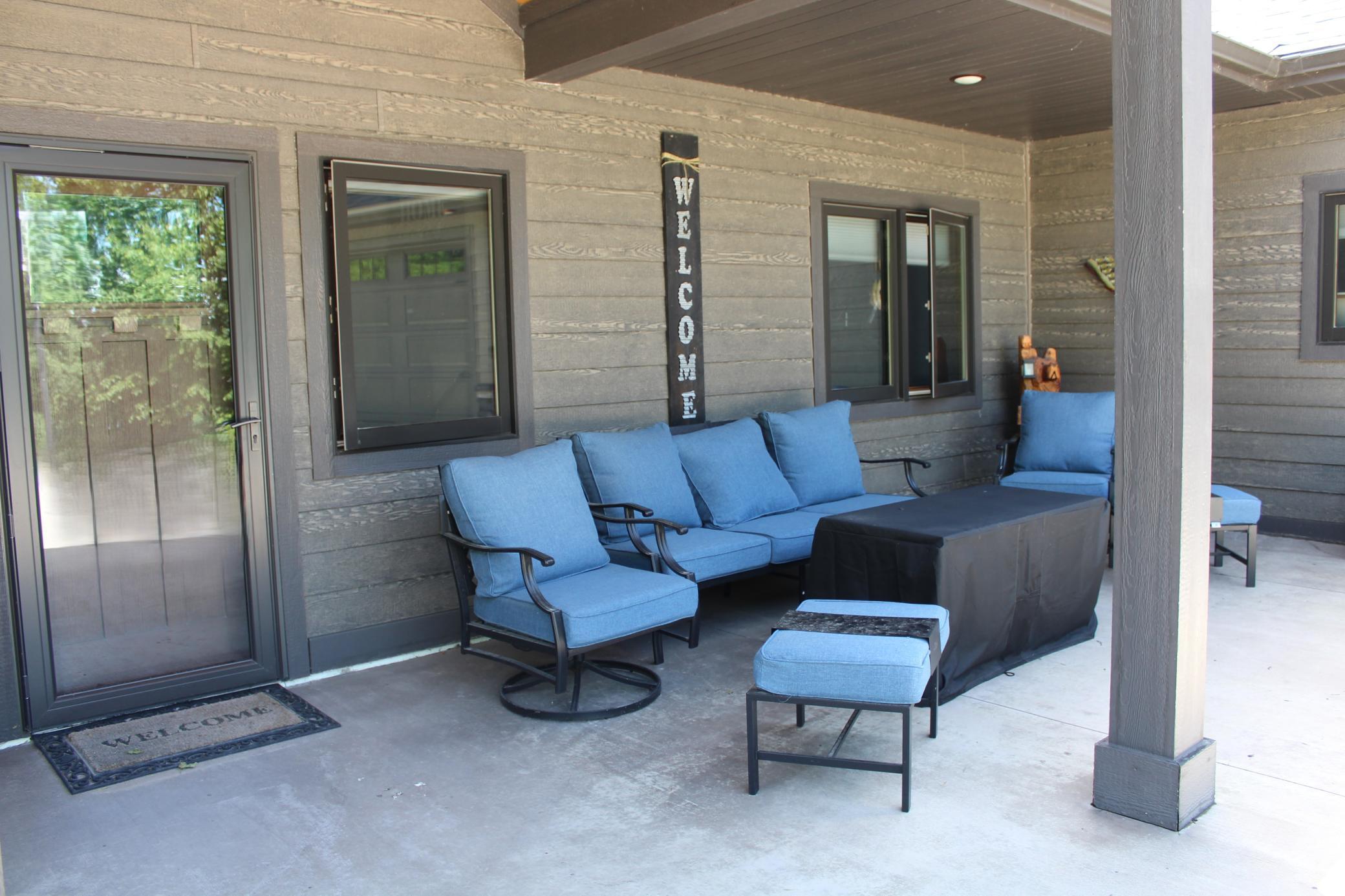 Welcoming front patio-Anderson E Series casement windows throughout