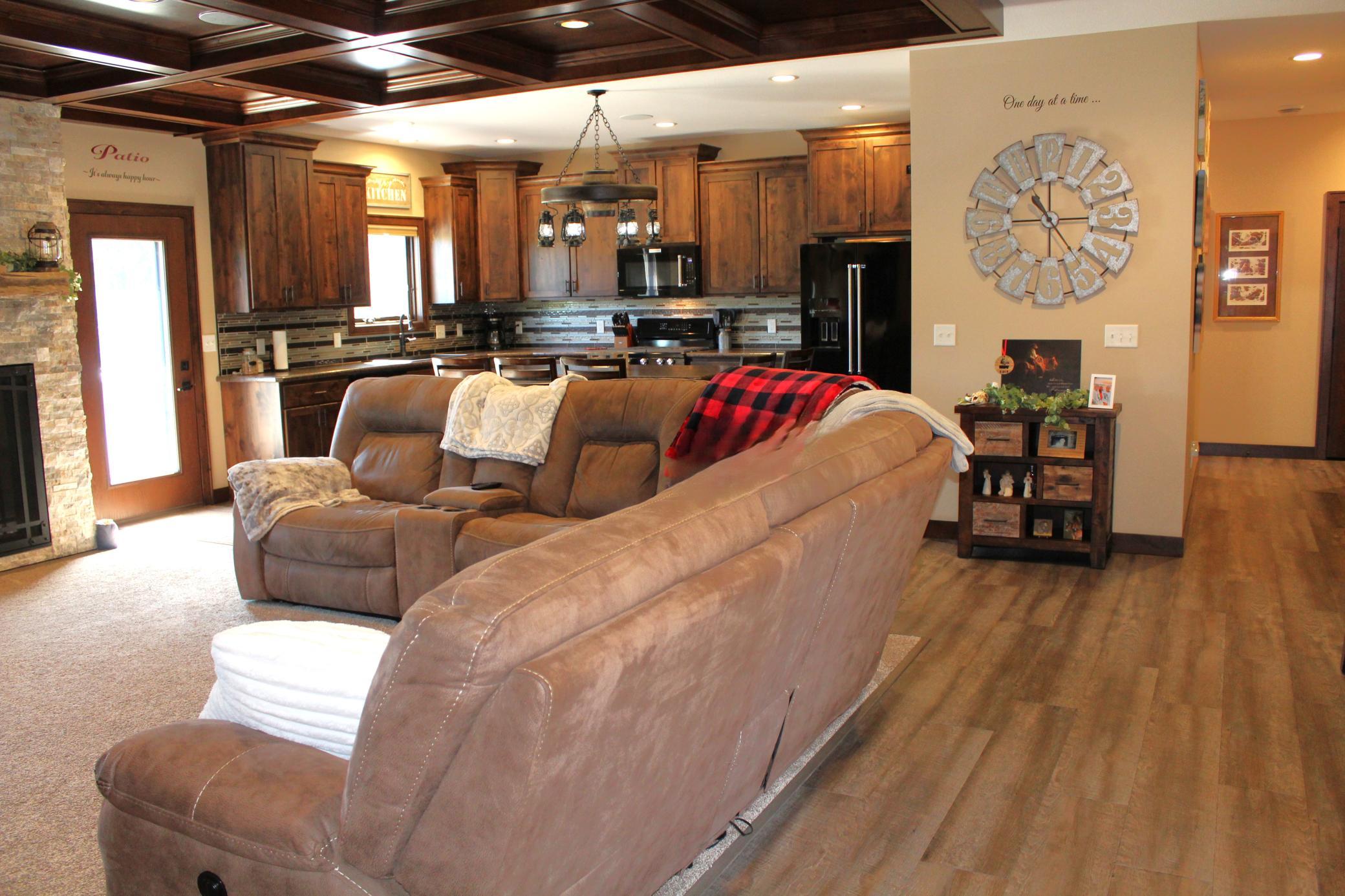 Bright, open main floor with coffered ceiling