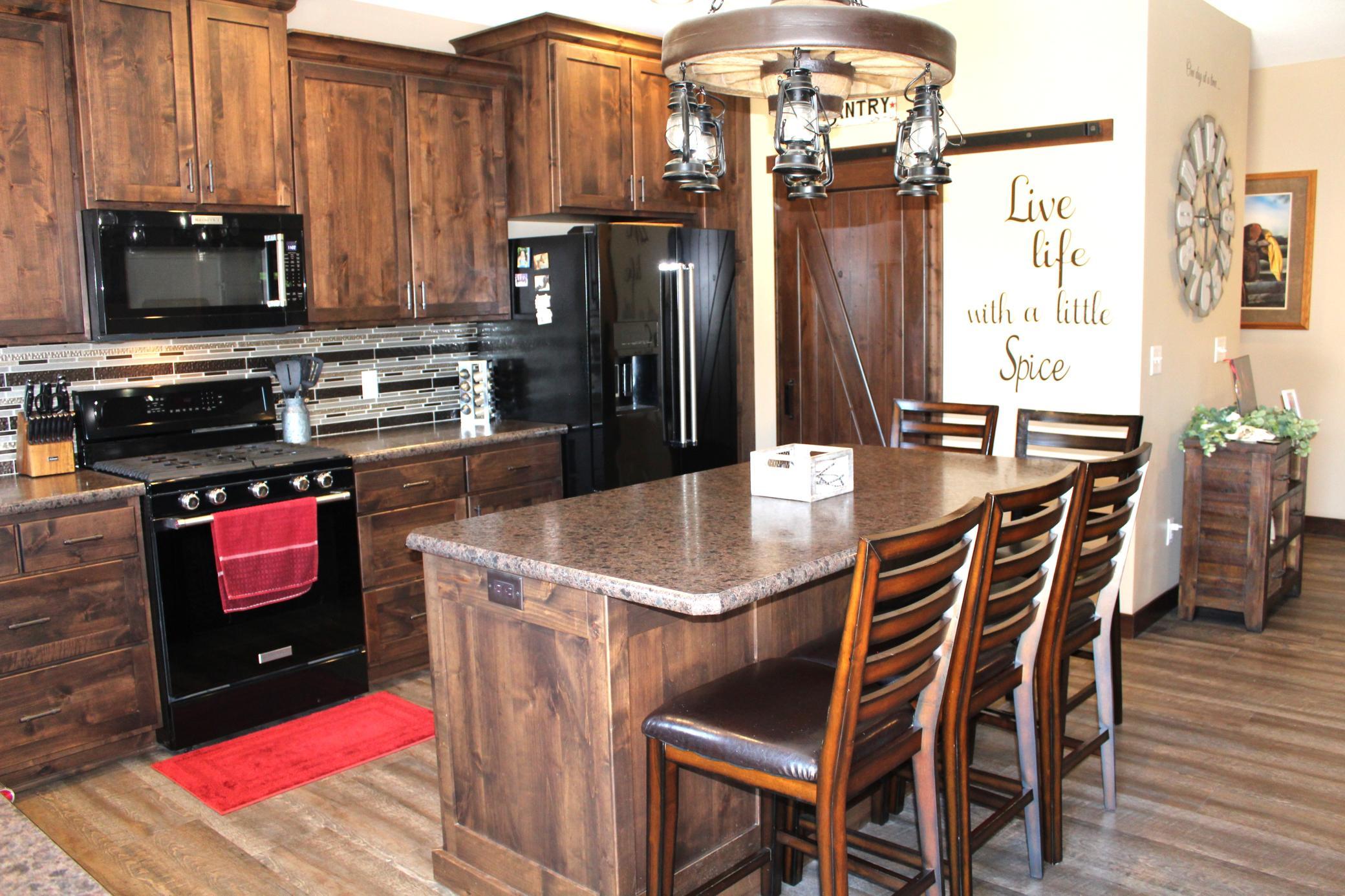 Kitchen- Custom knotty alder cabinets 42"and 48" uppers