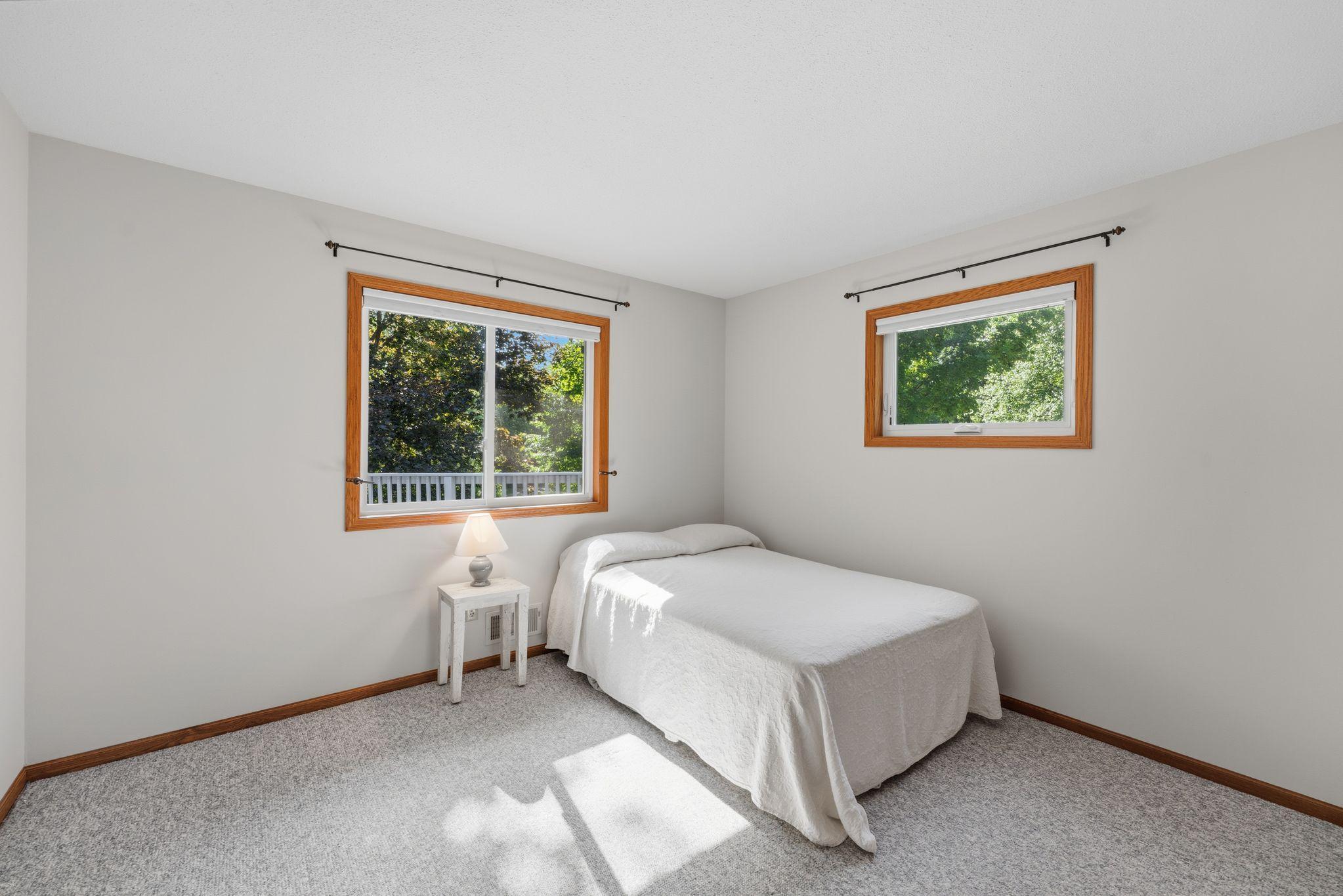 Upper level bedroom with nice big windows