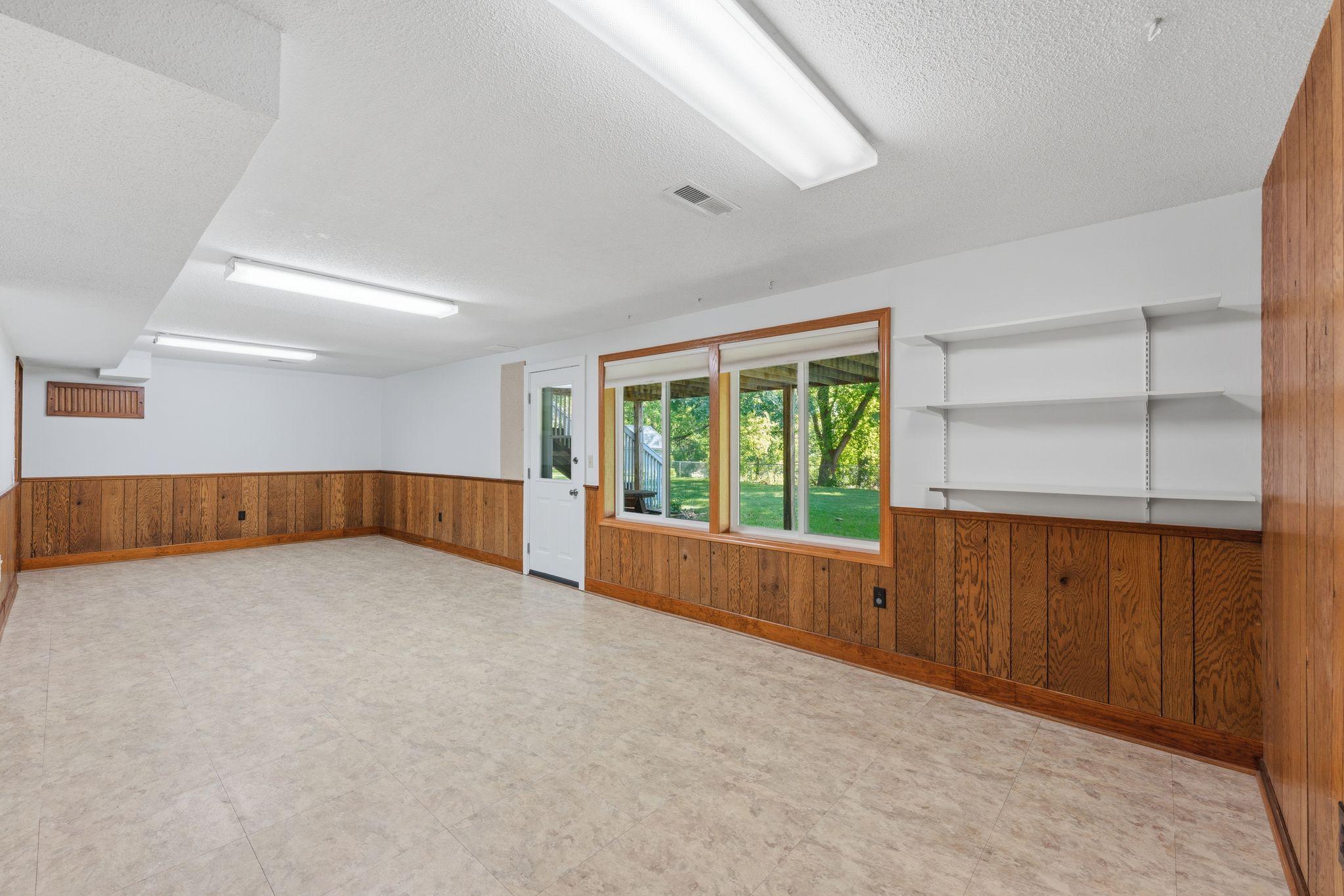 Lower level with acess to backyard and patio