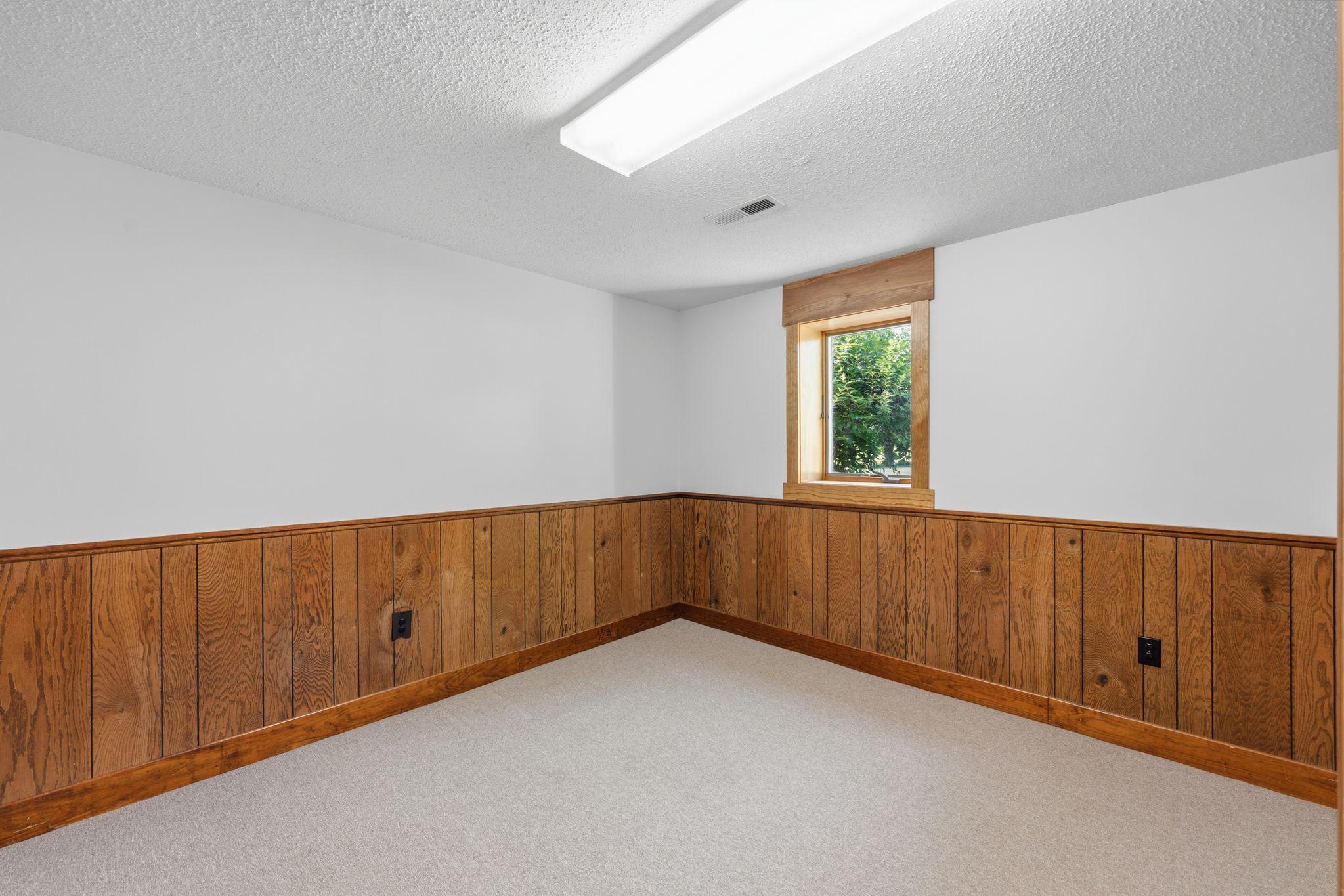 Lower level 4th bedroom with egress window