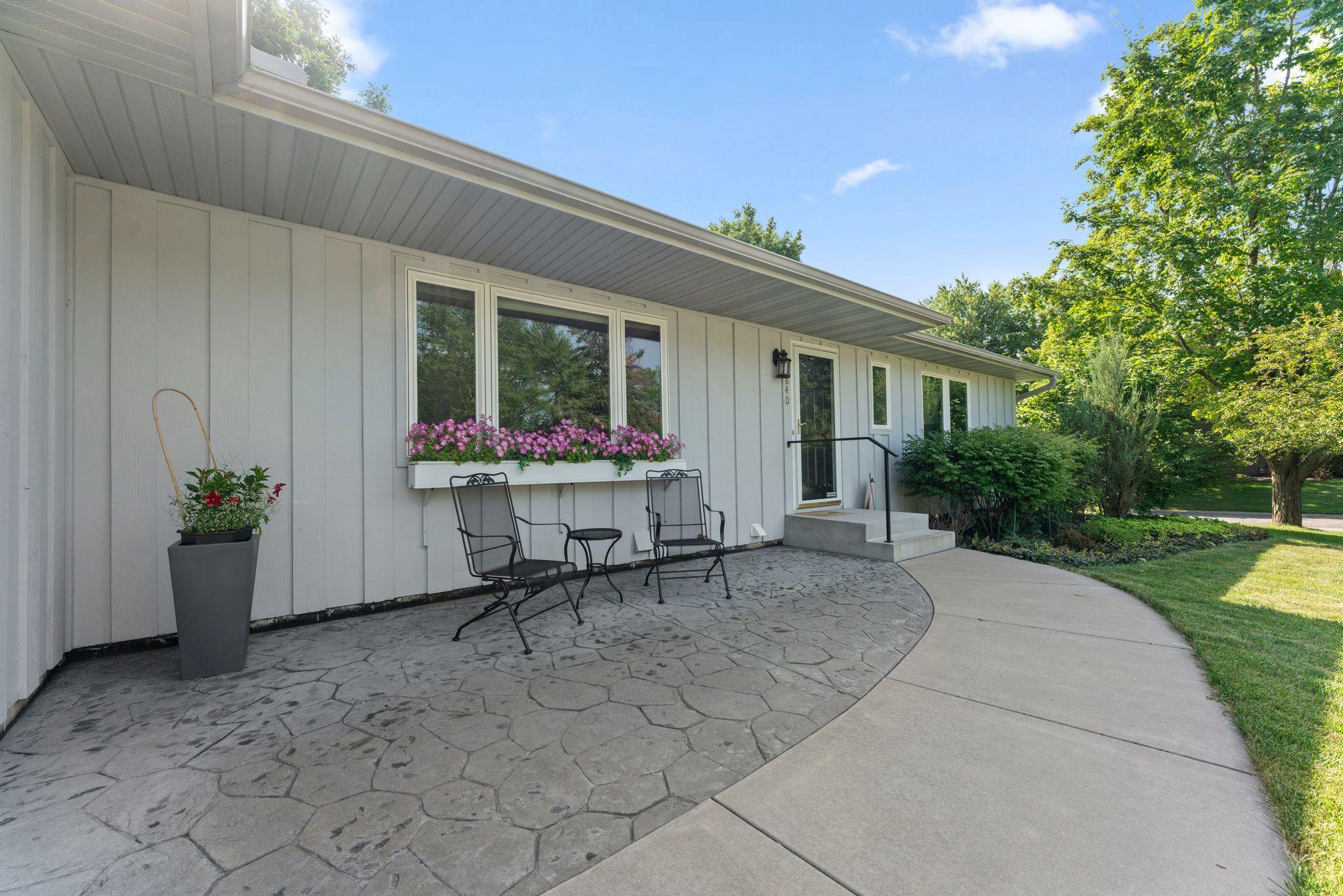 Wonderfully maintained rambler with updated doors/windows and a huge lot