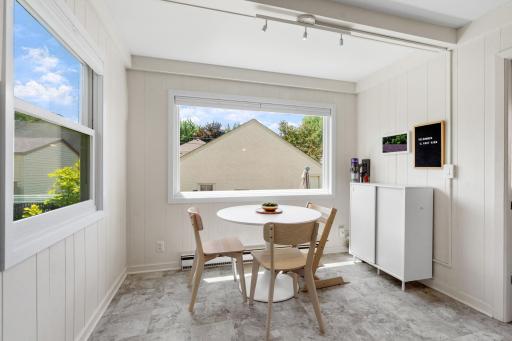 Enjoy new kitchen windows overlooking backyard