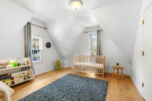Fourth bedroom features beautiful diamond pane window