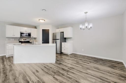 The kitchen island really delivers the function and flexibility you expect in a contemporary open floorplan like this