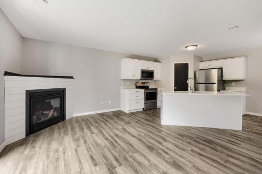 Don't miss the updates and upgrades in this townhome including all appliances and kitchen cabinets and counters