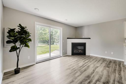 Lower main level has a gas fireplace and walks out right to the park preserve