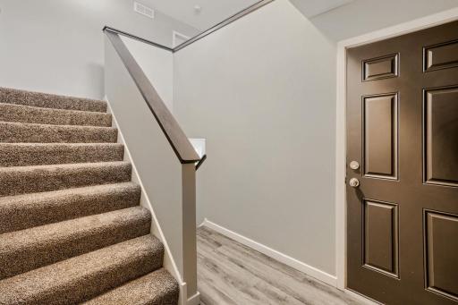 A useful and useable foyer connects directly to the garage as well as the front door and boasts a true entry/coat closet