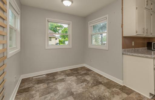 Cozy dining space just wrapped in natural light AND all these new windows!