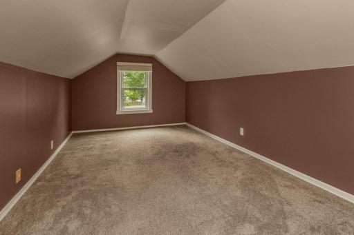 Upstairs is a spacious bedroom/office/playroom/exercise space - you decide! Clean, good ceiling height and ready for your touches