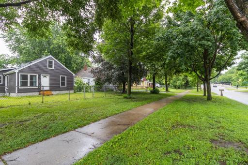 last look from Wheelock Parkway! Yard is fully fenced and very well sized.