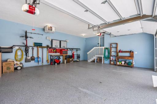 Fully finished oversized 3 car heated garage. 2ft wider and 1 ft deeper than standard in the community. Heated, insulated, hot & cold water, floor drains and finished walls, ceiling and epoxy floor!