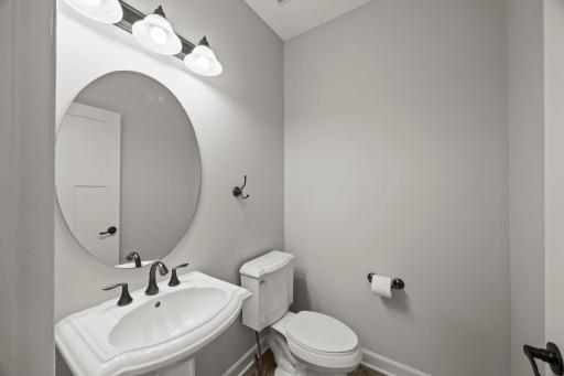 Convenient access to a Â½ bathroom and the attached garage.