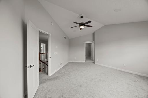 Vaulted 10-ft ceilings, pond views, and 11x9 walk-in closet.