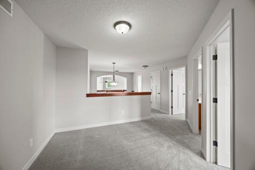 Upstairs, a versatile landing offers space for a reading nook, study area, or hobby zone.