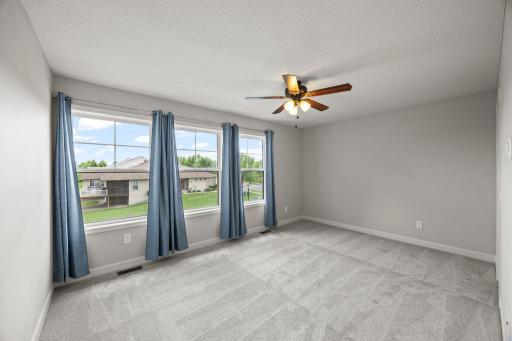 Three additional bedrooms are generously sized.