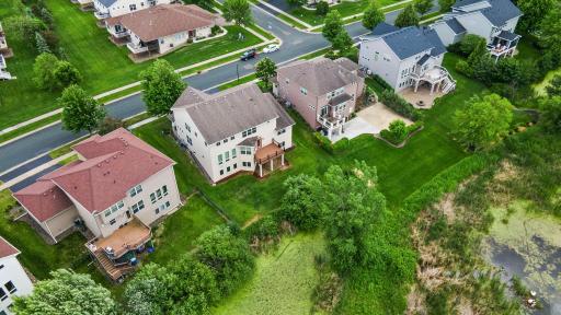 Framed by thoughtfully maintained landscaping and an in-ground sprinkler system that keeps everything looking its best with ease.