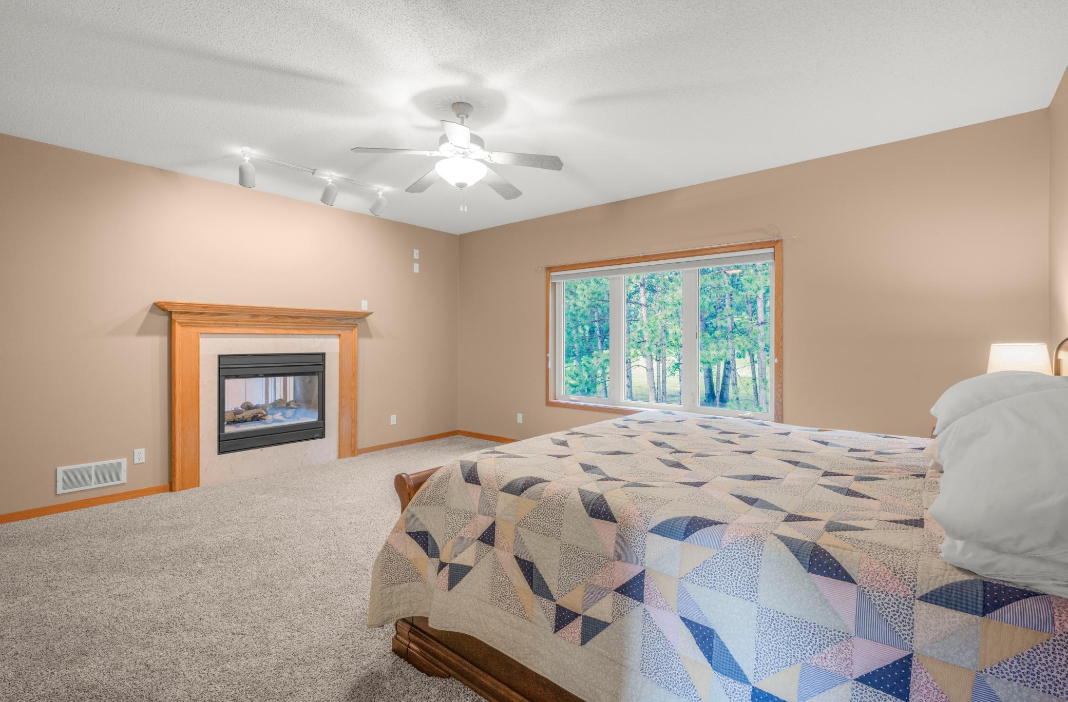 Double Sided Fireplace in Primary Bedroom!