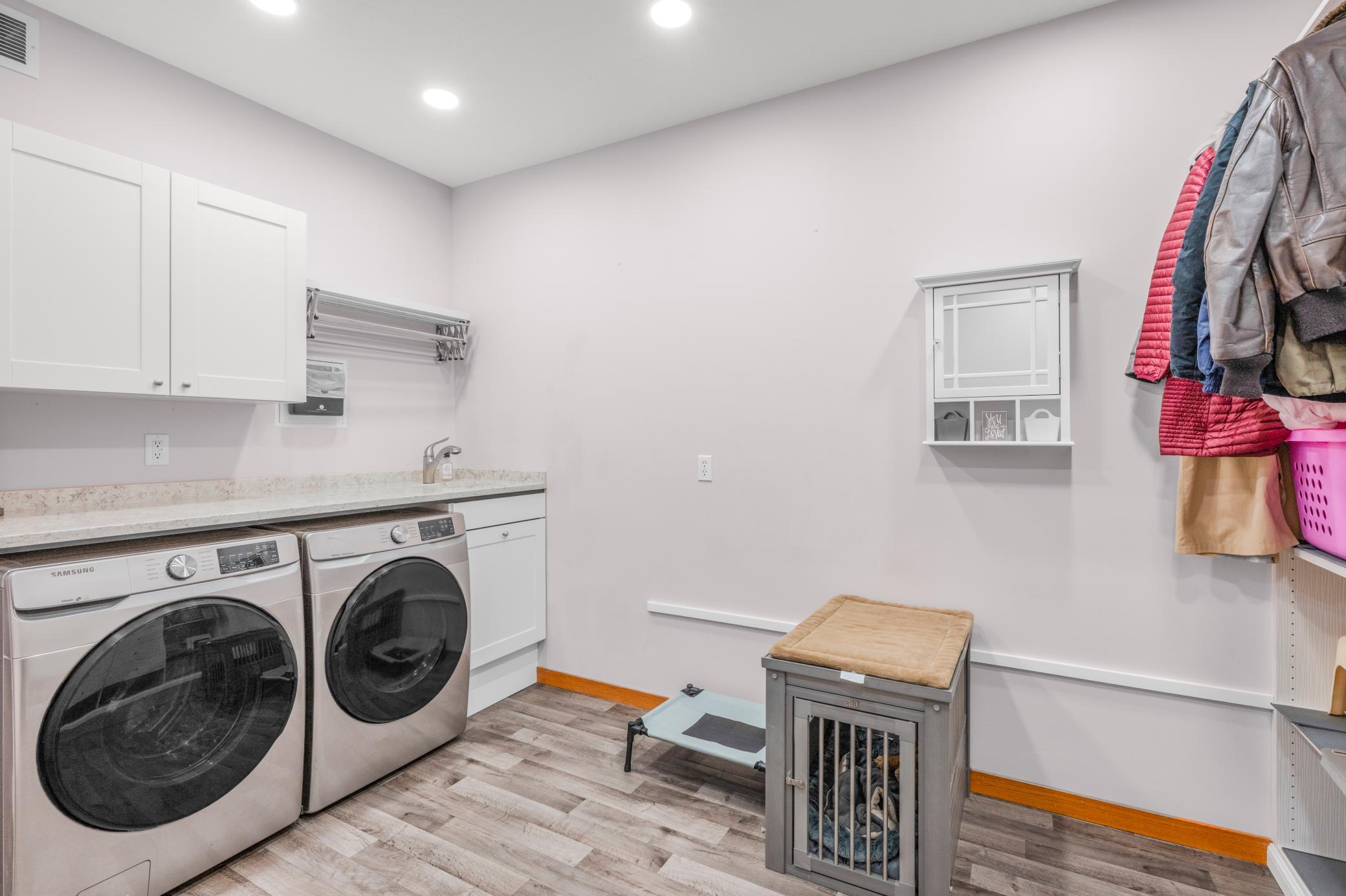 Laundry room updated. Added storage by Closets By Design