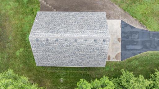 Shingles and gutters replaced in spring 2023 due to hail storm in 2022. Class 3 shingles installed.