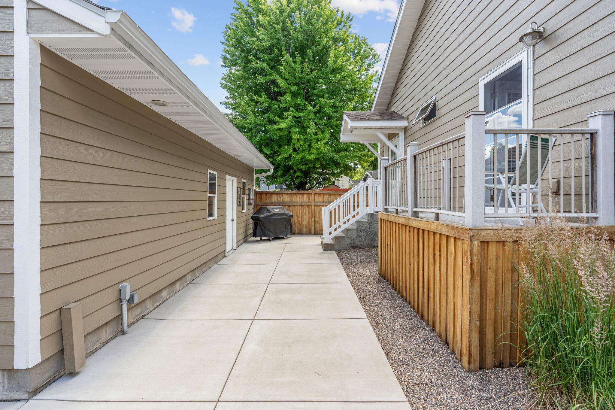 Backyard is fully paved with concrete - there is no grass in the backyard.