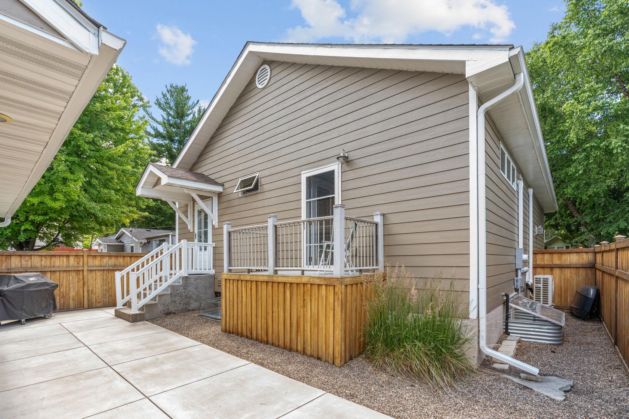 Backyard is fully paved with concrete - there is no grass in the backyard.