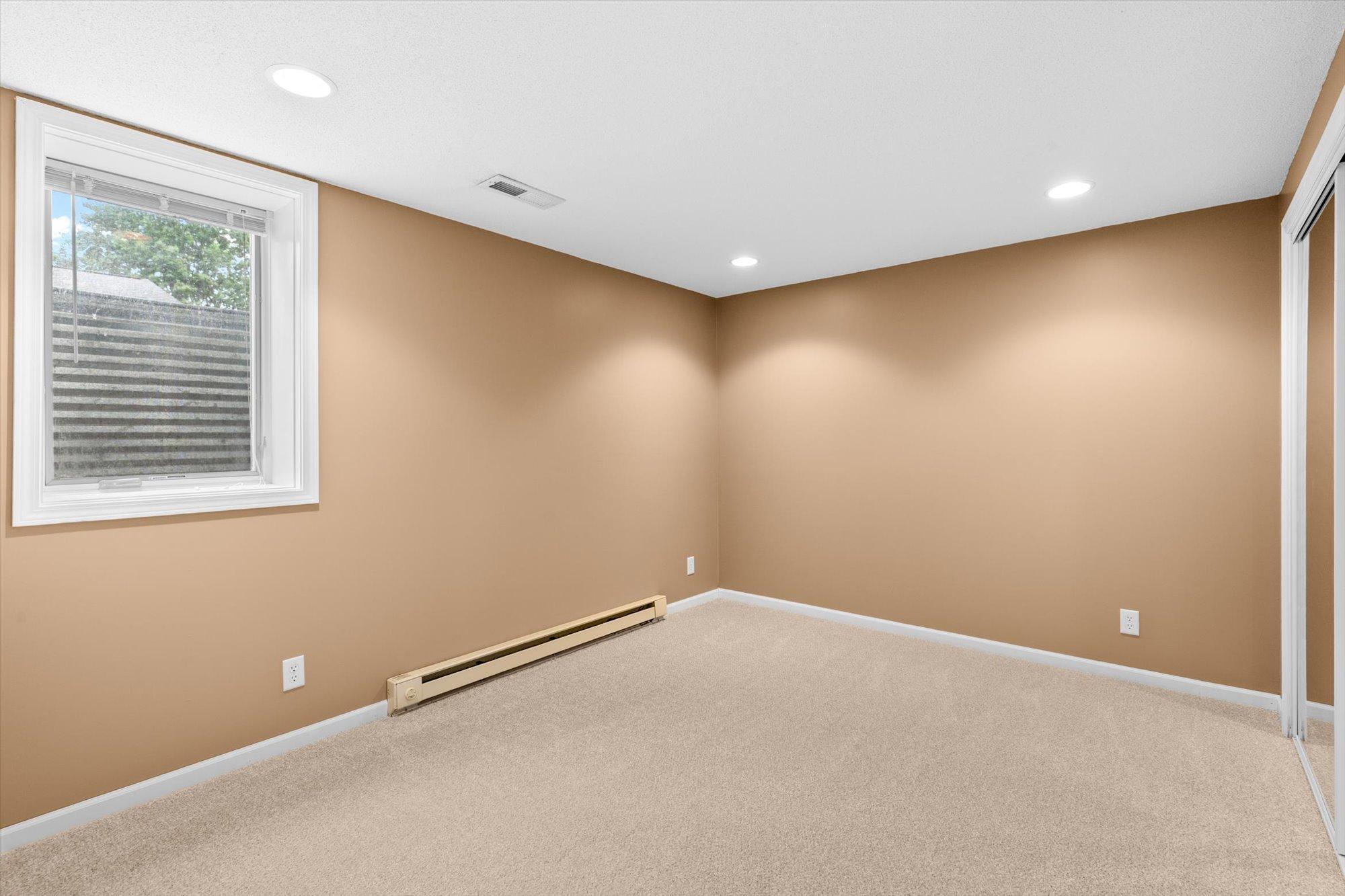 4th bedroom with fresh paint & carpet