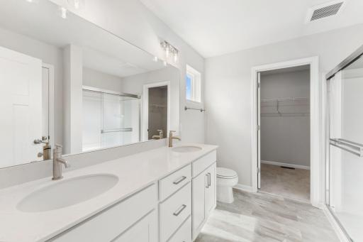 Owner's bathroom with dual sinks. Pic for layout purposes. Fixtures/lighting/hardware will be matte black