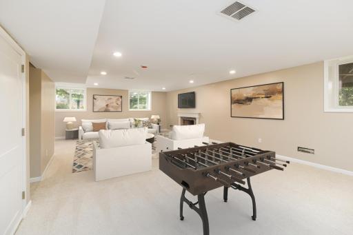 Basement family room - virtually staged.jpg