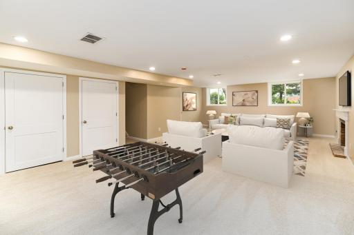 Basement family room - virtually staged.jpg
