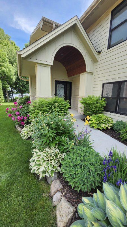 Beautiful blooms and meticulous landscaping create a welcoming retreat between days spent on the water.