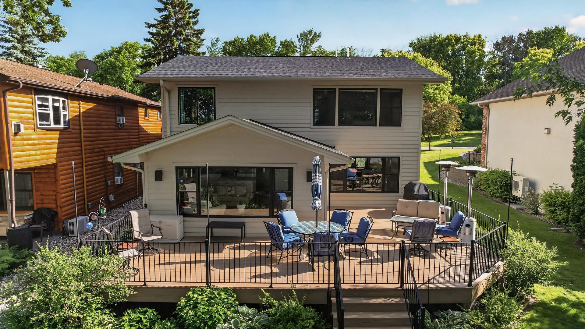 Designed for lake-life entertaining, this inviting maintenance-free deck provides ample space for dining, lounging, and making memories.